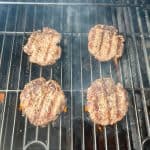 hamburgers on a grill for all American grilled hamburgers
